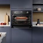 Oven_OE4EH_KitchenOpenedCrop_Electrolux_Spanish-4500x4500